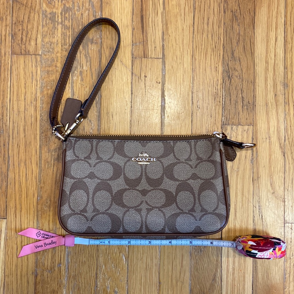 As is Coach outlet wristlet.